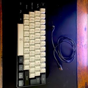 This is a 61-key RGB streamer gaming keyboard.